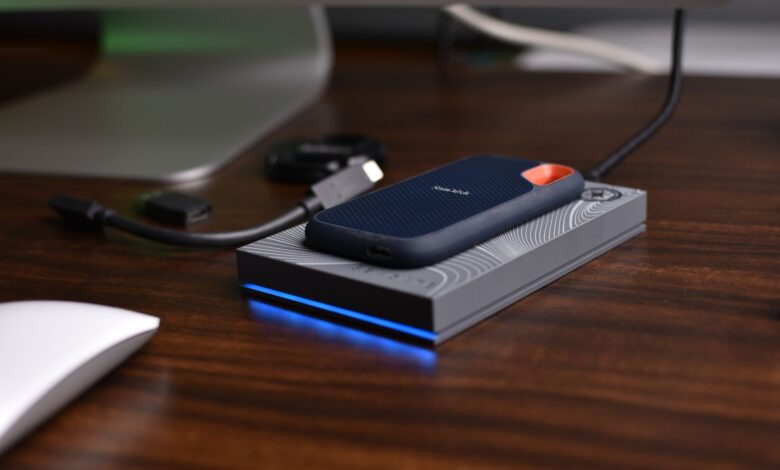 NVMe SSD drives side by side on a dark surface for comparison