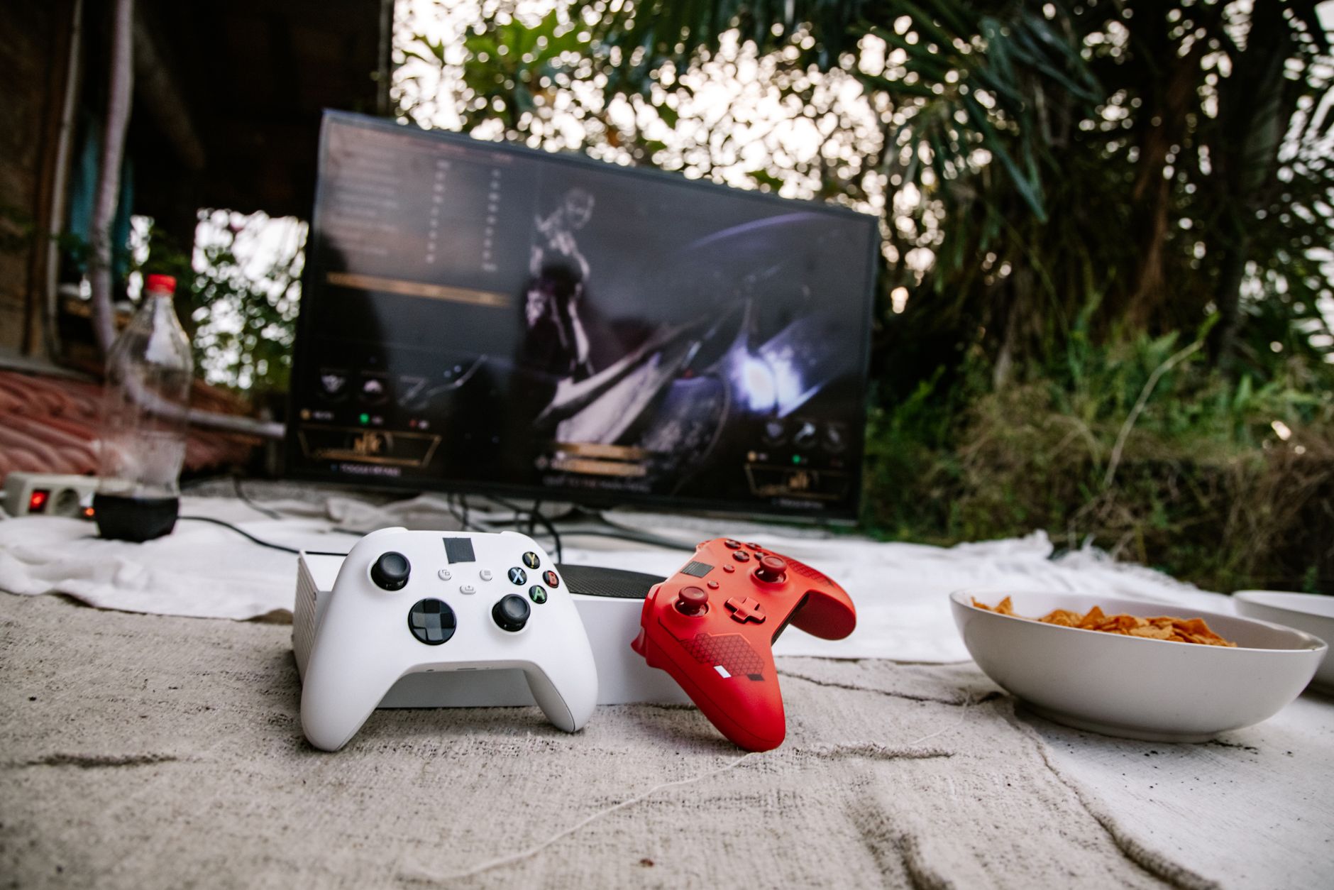 A 4K gaming monitor displaying a detailed game environment